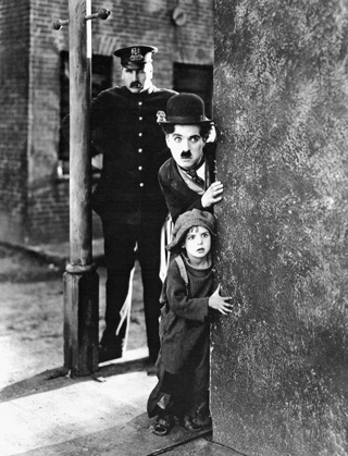 Charles Chaplin en The Kid